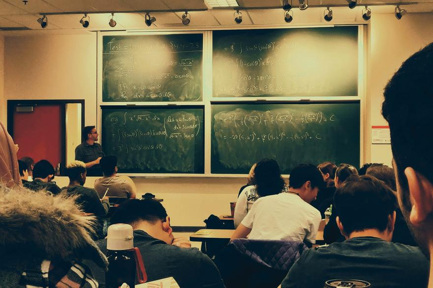A lecture hall with a chalkboard